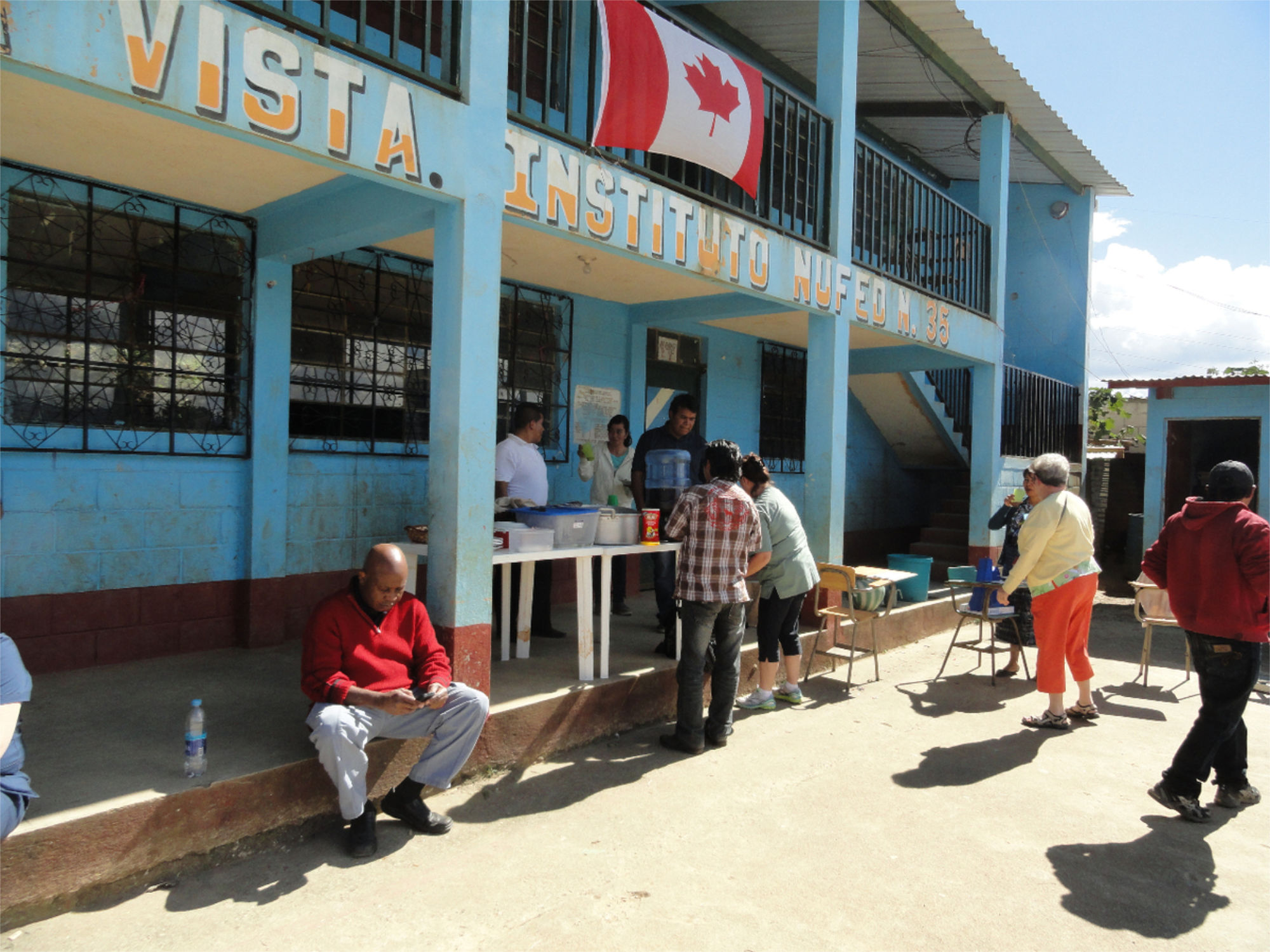 People waiting outside the community nursing clinic